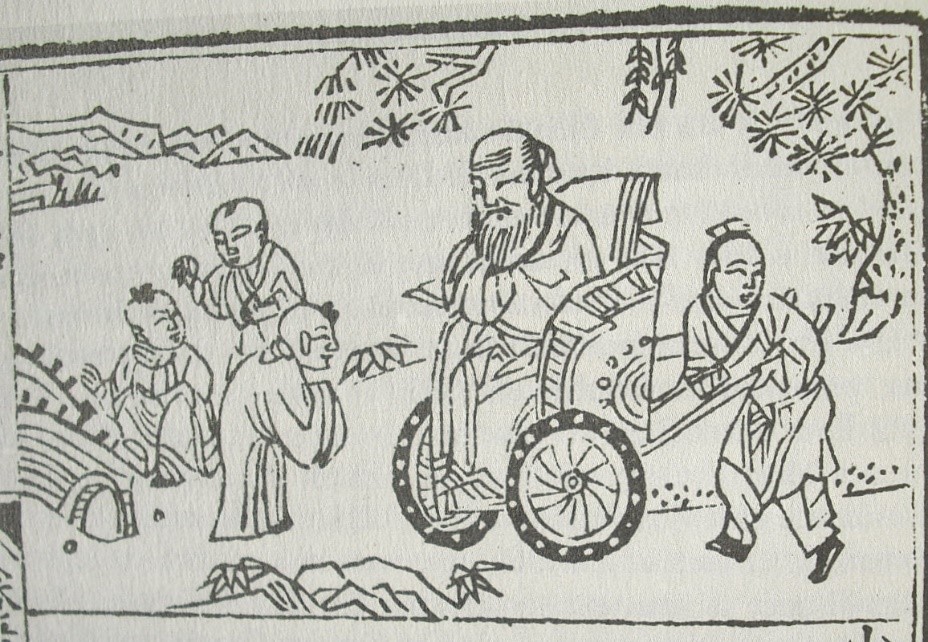 Konfucius sedí v invalidnom vozíku a zhovára sa s dieťaťom.